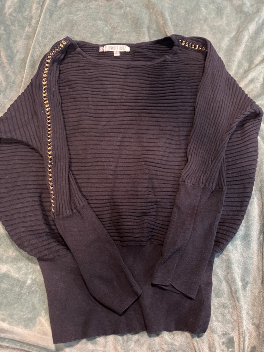 Jennifer Lopez Black Ribbed Crewneck Sweater with Gold Chain Detail